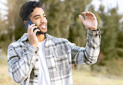 Buy stock photo Phone call, man and relax while in a park for walking, calm and smile against a tree background. Smartphone, conversation and handsome male enjoying a walk in nature while talking, looking and fun