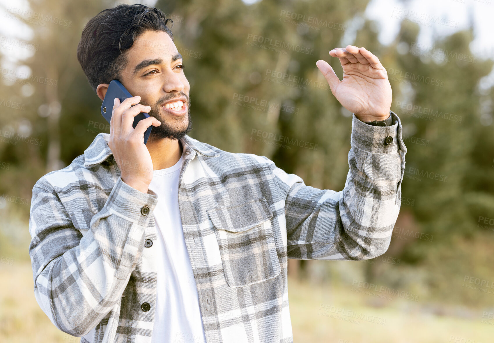 Buy stock photo Phone call, man and relax while in a park for walking, calm and smile against a tree background. Smartphone, conversation and handsome male enjoying a walk in nature while talking, looking and fun