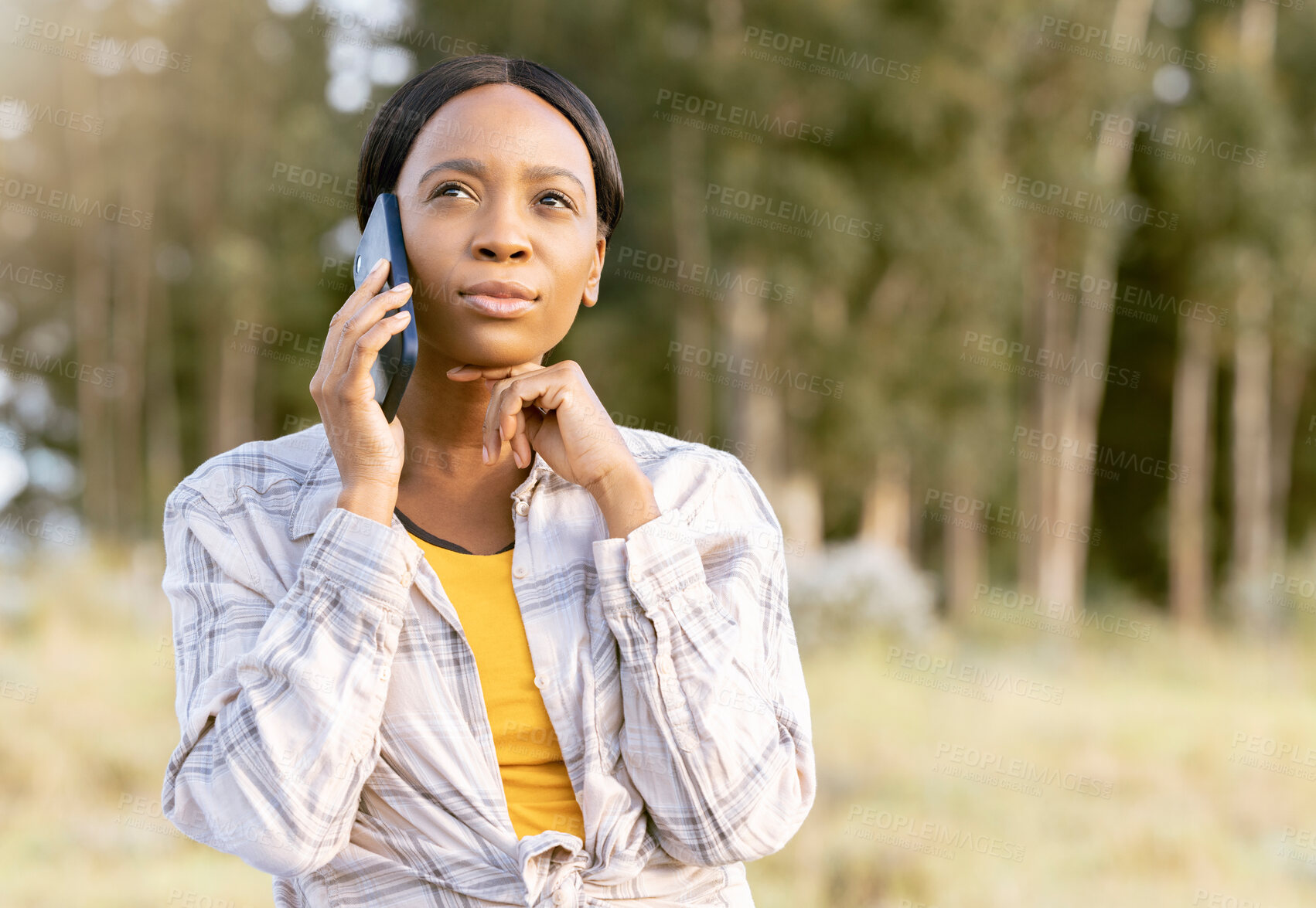 Buy stock photo Black woman, phone and thinking on call in nature for communication, travel or cellular 5G service outdoors. African American female contemplating trip, traveling or decision on smartphone