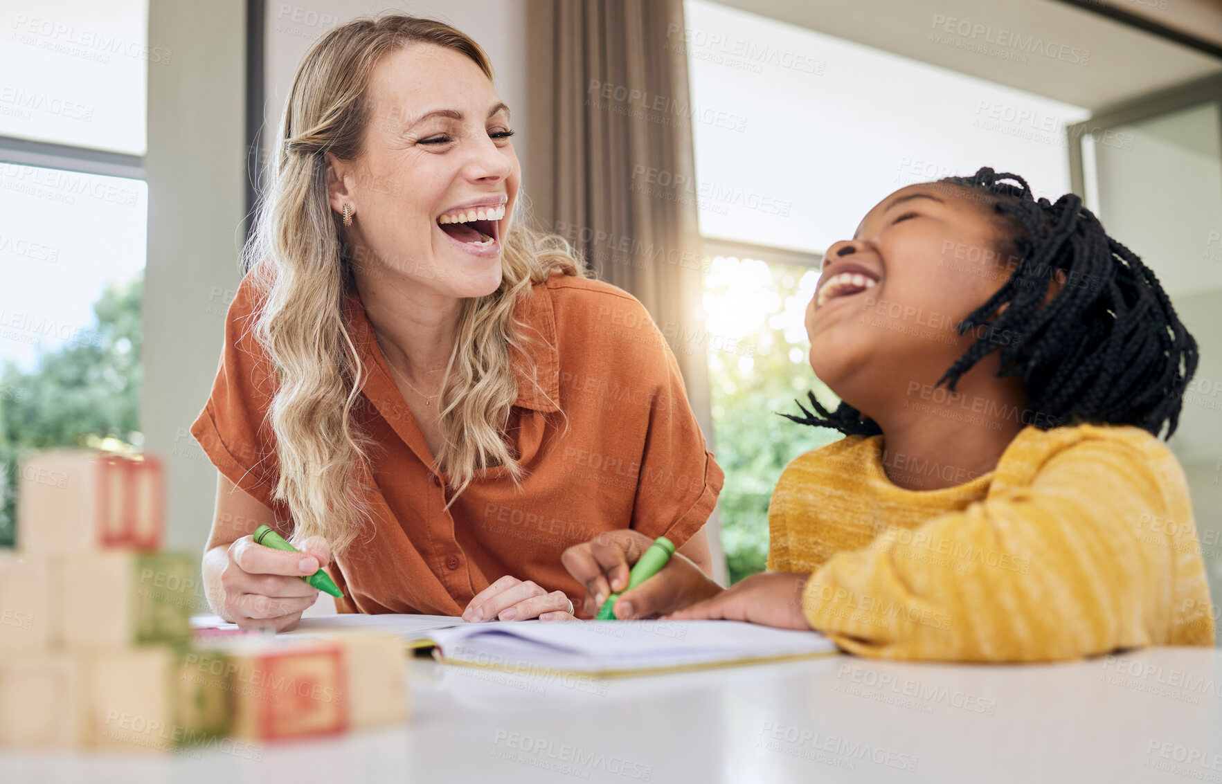 Buy stock photo Laugh, child development and interracial family in a home learning in a living room with drawing. Parent love, funny joke and mother care with girl together in a house with study game and toys 