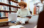 Student learning, laptop research and black woman in library working on the floor with books. Reading, computer research and online study of a person with test and exam information for university