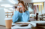 Woman student, stress with headache and university burnout, tired about paper deadline or study for exam in library. Campus, college studying fatigue with scholarship problem, pain and mental health