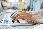 Closeup, student man and typing on laptop at desk for studying, planning and learning for goals. Hands, keyboard and computer for brainstorming, vision and research for ideas at university library