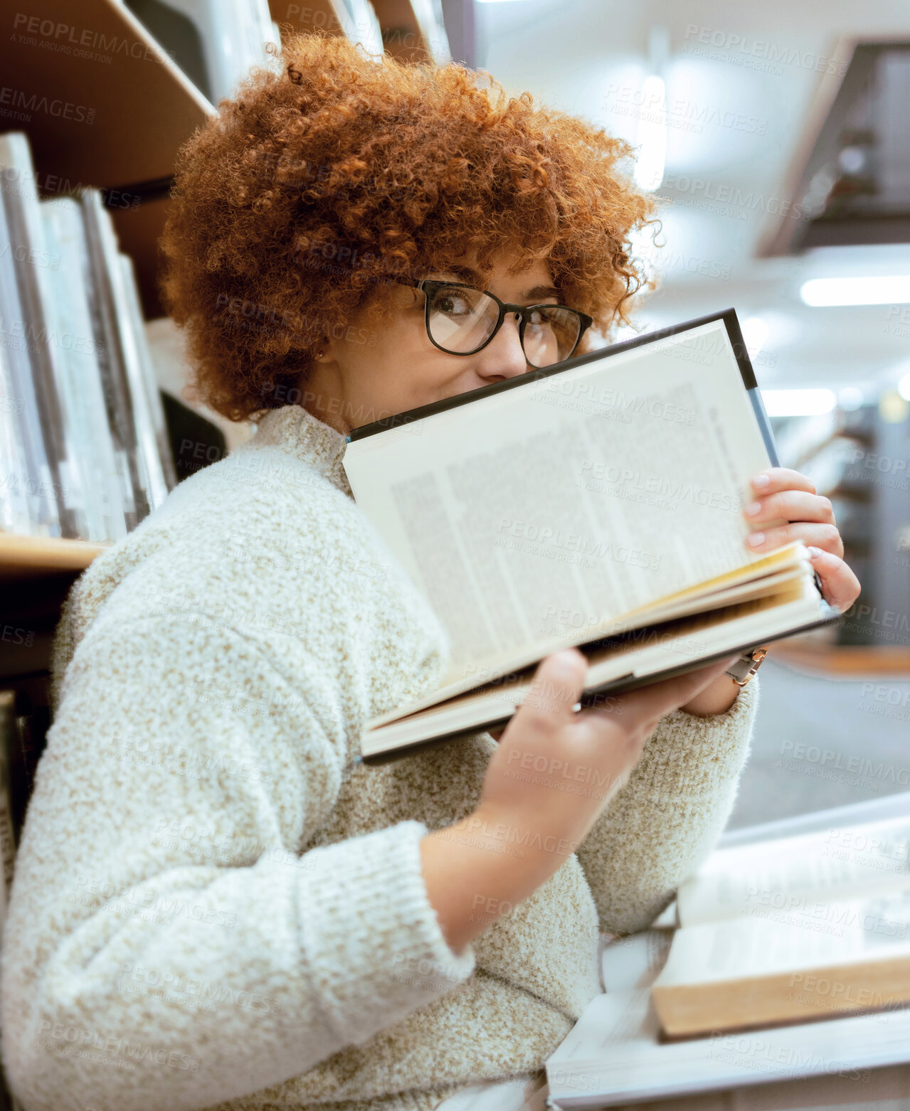 Buy stock photo Books, education or black woman in a library reading for knowledge or development for future growth. Scholarship, portrait or focused school girl studying or learning college information on page