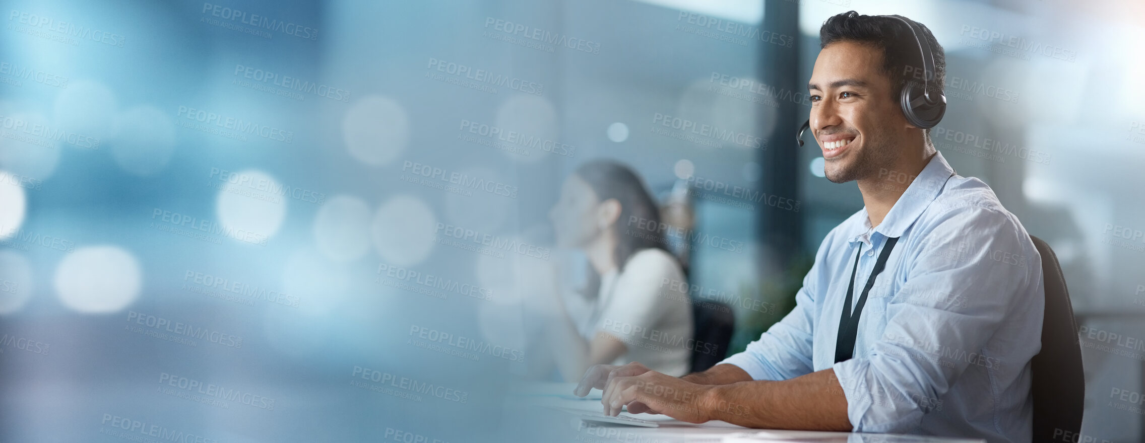 Buy stock photo Crm, mockup or consultant typing in a call center helping, talking or networking online via email. Digital, happy Asian man or insurance agent smiles in communication at customer services or sales 