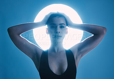 Buy stock photo Spotlight, vintage and portrait of a sexy woman with confidence isolated on a dark background in studio. Creative, fashion and aesthetic model with empowerment, pose and elegance on a backdrop