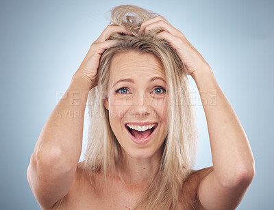 Buy stock photo Messy, itchy and portrait of woman with hair care isolated on blue background in a studio. Stress, shampoo and face of a frustrated woman with a beauty problem, scratching with dandruff on a backdrop