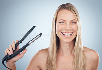 Buy stock photo Face portrait, hair straightener and beauty of woman in studio isolated on gray background. Balayage, haircare and happy female model with flat iron product for hairstyle, grooming or salon treatment