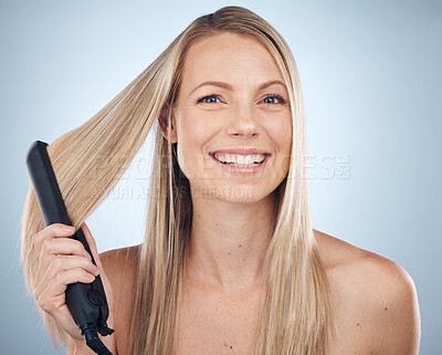 Buy stock photo Hair straightener, face portrait and beauty of woman in studio isolated on gray background. Balayage, haircare and happy female model with flat iron product for hairstyle, grooming or salon treatment