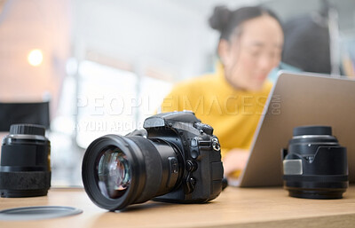 Buy stock photo Photography camera, laptop and photographer editing photoshoot, focus on digital art or retouching artistic photo. Studio, creative vision and professional Asian woman working on creativity process