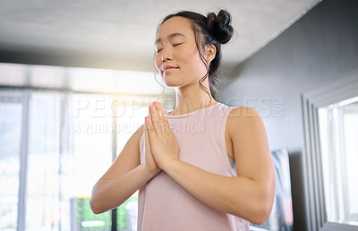 Buy stock photo Yoga, meditation and praying woman training her mind for peace, zen and calm start to the morning. Hope, freedom and Asian girl in the living room for a mindset exercise, spiritual and mindfulness