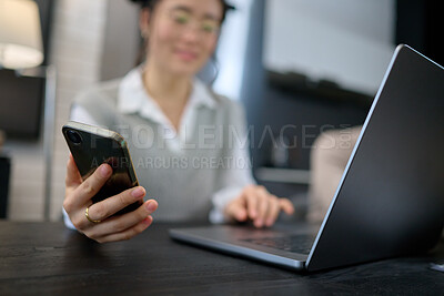 Buy stock photo Phone, networking or Asian woman with laptop for communication, social media or website blog content reading. Hand, typing or girl with smartphone for planning, research or internet digital search