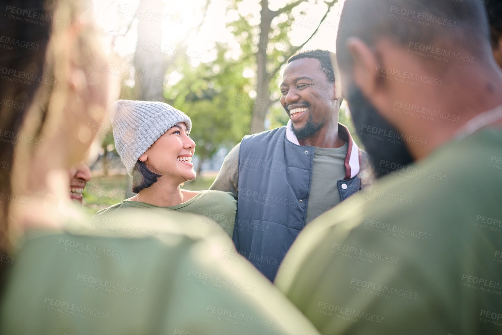 Buy stock photo Friends, diversity and happy volunteer group outdoor at a nature park in summer. Men and women people together for community service in green ngo tshirt for recycling, teamwork and a clean enviroment