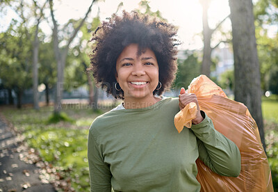 Buy stock photo Trash, volunteer portrait and black woman cleaning garbage pollution, waste product or environment support. Plastic bag container, NGO charity and eco friendly person help with nature park clean up