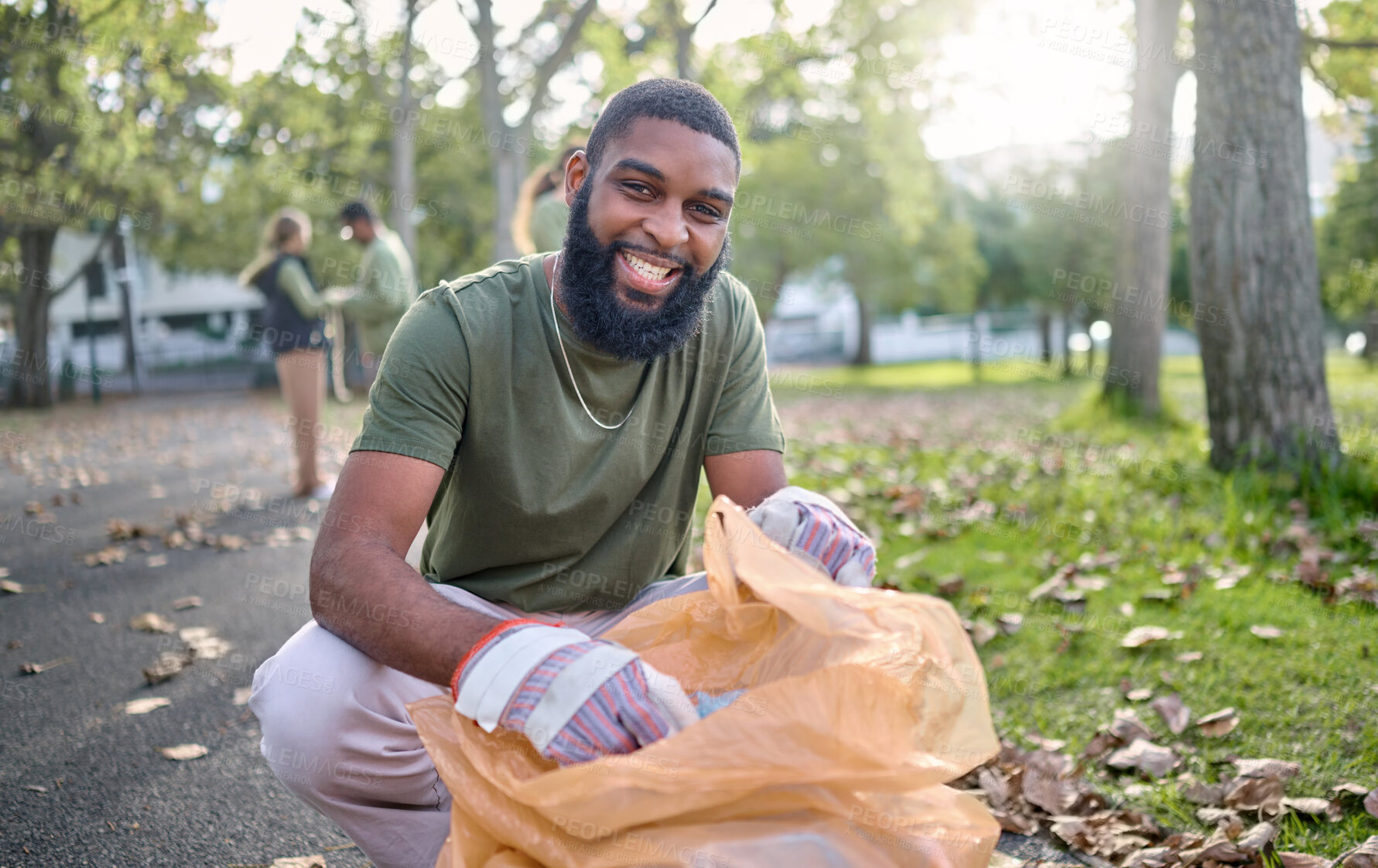 Buy stock photo Black man, volunteer portrait and plastic bag for community park cleanup, recycling or cleaning. Ngo person outdoor in nature to recycle, earth day or happy about a clean from pollution enviroment