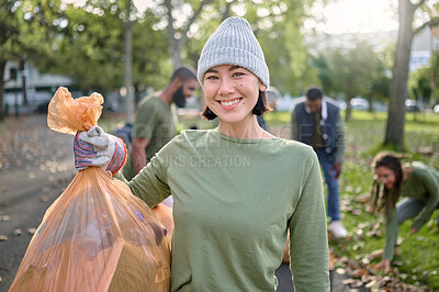 Buy stock photo Park, plastic bag and woman in cleaning portrait for eco friendly environment, community service or volunteering. Recycle, trash or waste goals of happy ngo person in nature, forest pollution support