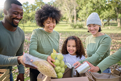 Buy stock photo Volunteering, donation food and people with child for sustainability, poverty help and community service in park. Support, teamwork and fruits, vegetable and box for homeless, charity or society care