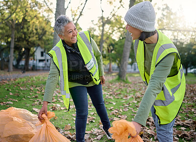Buy stock photo Volunteer, happy women and community service while cleaning park with garbage bag for a clean environment. Team helping with trash for eco friendly lifestyle, ecology and recycling outdoor in nature