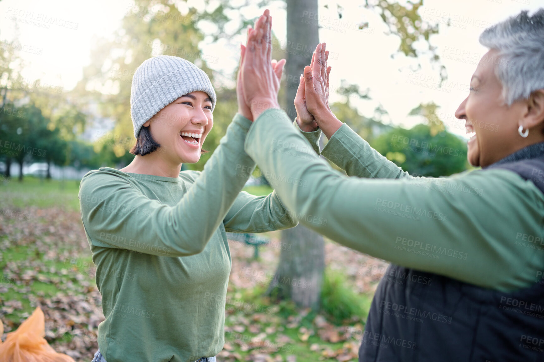 Buy stock photo High five, volunteer and community celebrate cleaning garbage pollution, waste product or environment support. Happy diversity team, NGO charity help or eco friendly people done with nature clean up