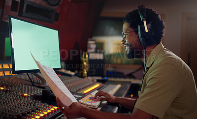 Buy stock photo Man, happy or music sheets in recording, sound engineering or song composition studio. Producer, singer or smile musician with headphones on technology mockup for radio, audio or media album mixing