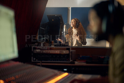 Buy stock photo Woman, singing or studio recording microphone for album, audio or radio music cover in night production. Singer, artist or musician with producer in evening song, media or sound performance practice