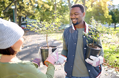 Buy stock photo Teamwork, gardening and man with woman in a park happy and smiling for plant growth for sustainability in the environment. Volunteer, black man and people excited for planting as in a garden