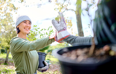 Buy stock photo High five, gardening and team on a farm or park and celebrating plant growth for sustainability in the environment. Volunteer, woman and people excited for community service and teamwork in a garden