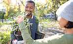 Plant, sustainability and people in a garden happy for agriculture and growth in the environment. Volunteer, black man and farmer excited for planting as in a park or nature for charity