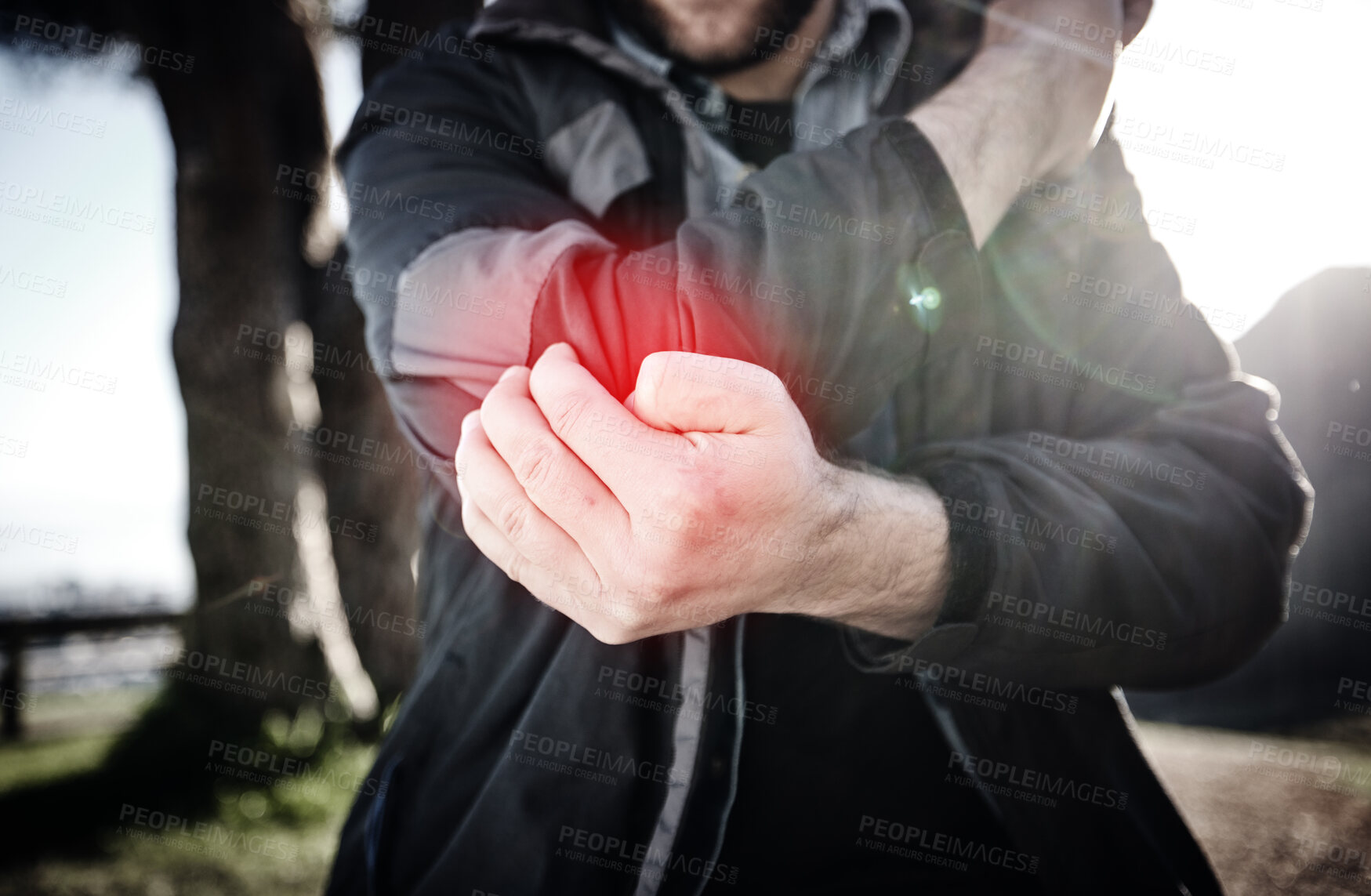 Buy stock photo Hands, elbow pain and arm injury after fall, accident or mistake outdoors. Sports, fitness or man with fibromyalgia, arthritis or inflammation, broken bones or painful joint after workout or exercise