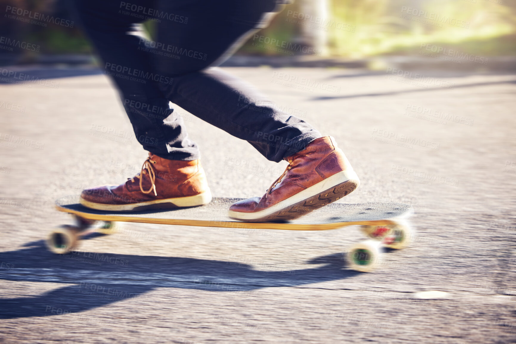 Buy stock photo Skateboard, feet and man skating on road for fitness, exercise and wellness. Training sports, shoes and legs of male skater on board, skateboarding or riding outdoors for balance or workout on street