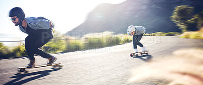 Sports, speed and fast longboard skating in road, friends racing downhill with skateboard and helmet for safety. Extreme sport adventure, skateboarding street race and skateboarder on mountain pass.