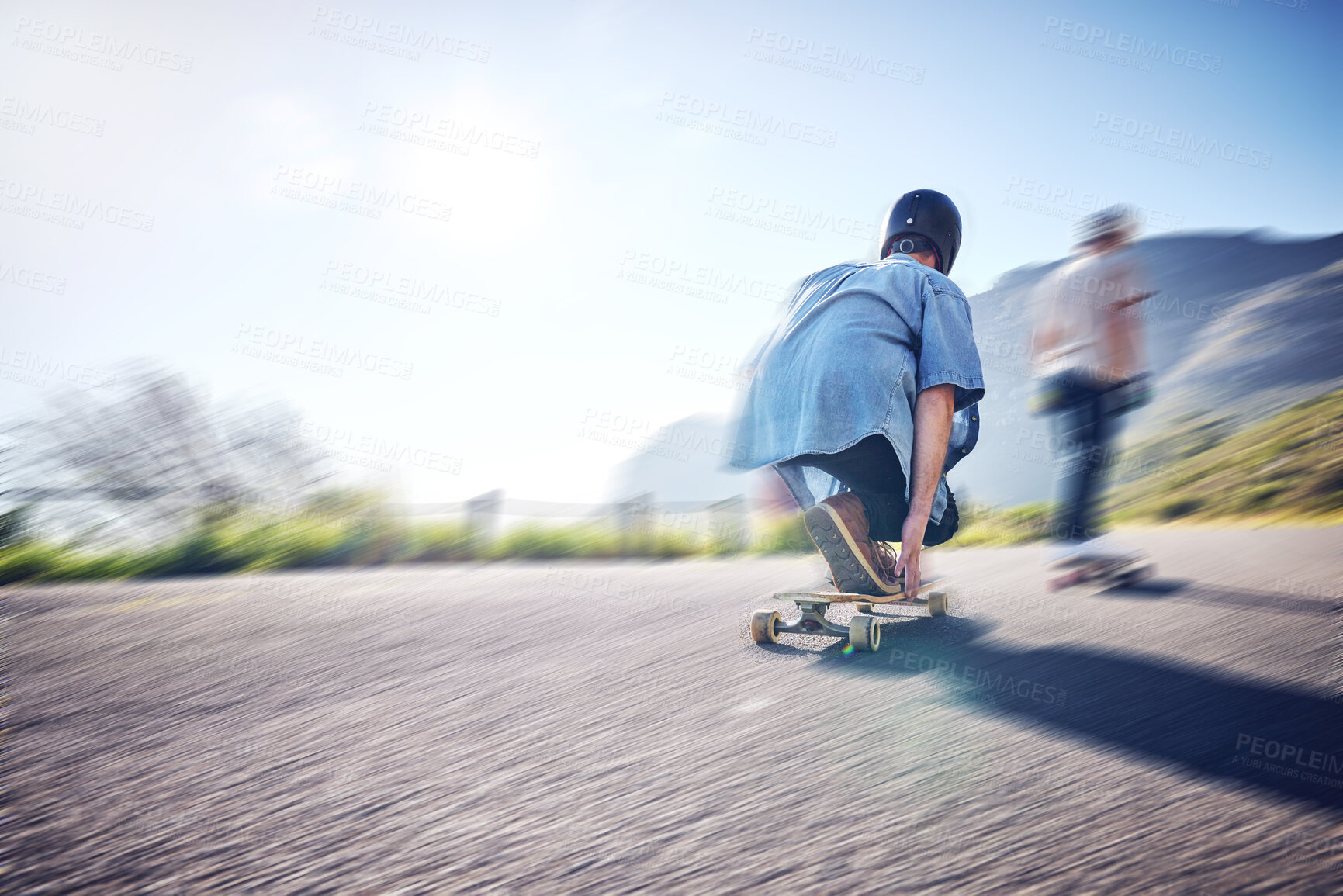 Buy stock photo Speed, fast and men skateboarding in the street for adventure, training and exercise in Philippines. Fitness, sport and friends in motion, moving and travel in the road on a skateboard in summer