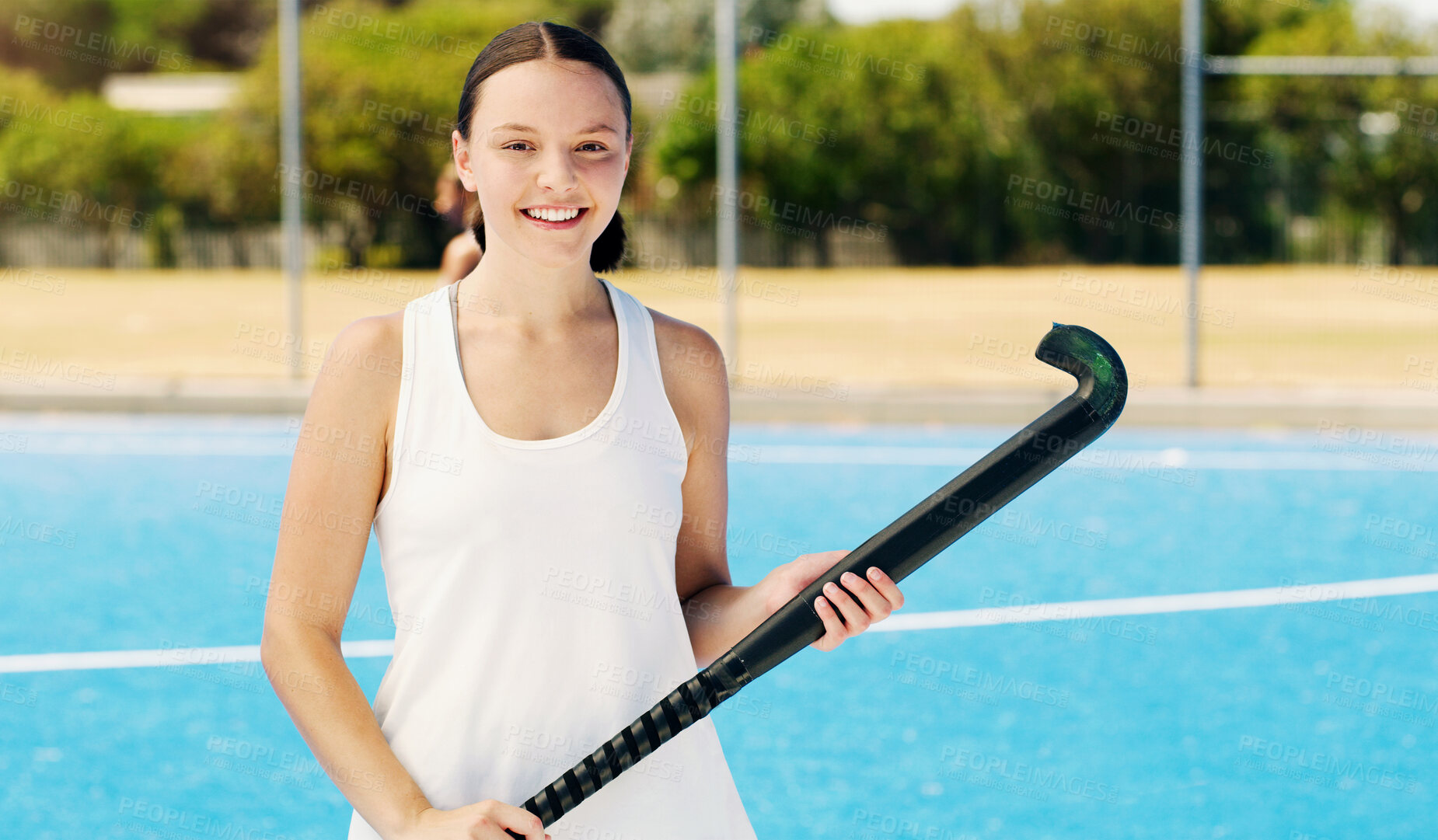 Buy stock photo Portrait, hockey girl and field with smile, focus or vision at outdoor training for future sports career. Happy gen z woman, sport workout or exercise for fitness, speed or balance in summer sunshine