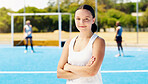 Portrait, hockey girl and smile on field with focus, goal and vision at outdoor training for future sport career. Happy gen z woman, sports workout or exercise for fitness, speed or balance in summer