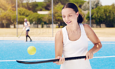 Tennis, racket and woman with ball for training, fitness and balance, practice and cardio at an outdoor court. Sports, girl and athletic professional excited, happy and getting ready for performance