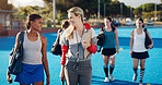 Team leader, hockey and collaboration with player in happy discussion for coaching or teamwork in the outdoors. Fitness sports coach talking with athlete in friendly conversation for training tips