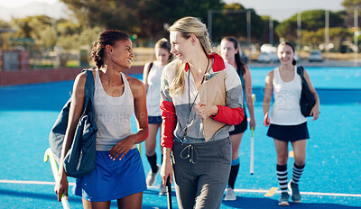 Buy stock photo Team leader, hockey and happy discussion with player for coaching, teamwork or collaboration in the outdoors. Fitness sporting coach talking with athlete in friendly conversation for training tips