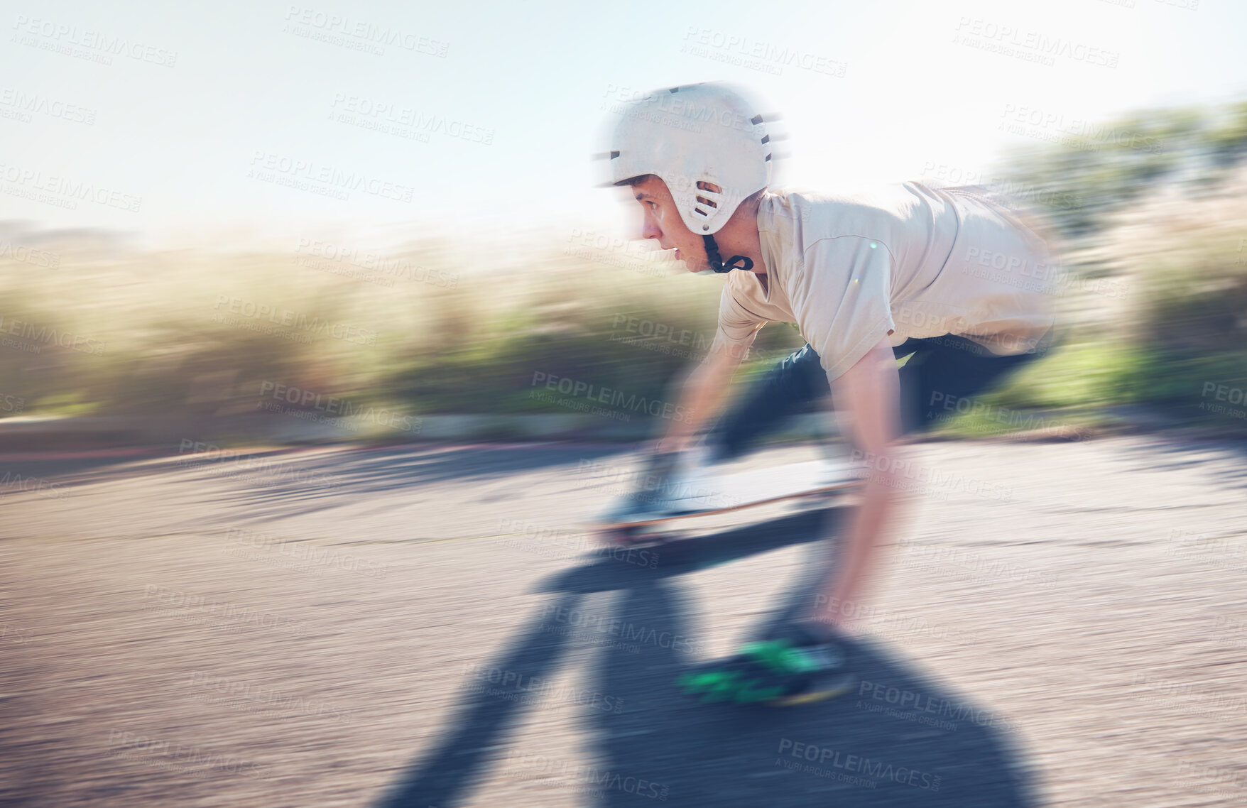 Buy stock photo Skate, blurred motion and speed with a sports man skating on an asphalt road outdoor for recreation. Skateboard, soft focus and fast with a male athlete or skater training outside on the street