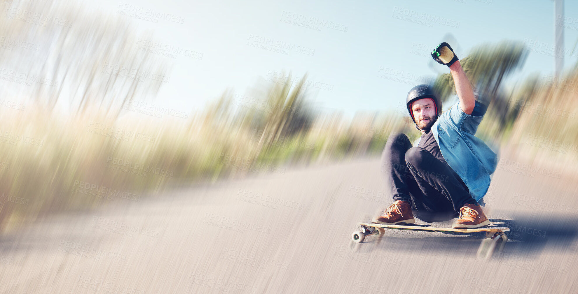 Buy stock photo Skateboard, motion blur or mockup with a sports man skating at speed on an asphalt street outdoor for recreation. Skate, soft focus and fast with a male athlete or skater training outside on the road