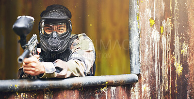 Buy stock photo Paintball, gun and war with a sports man playing a military game for fun or training outdoor. Camouflage, soldier and target with a male athlete shooting a weapon outside during an army exercise