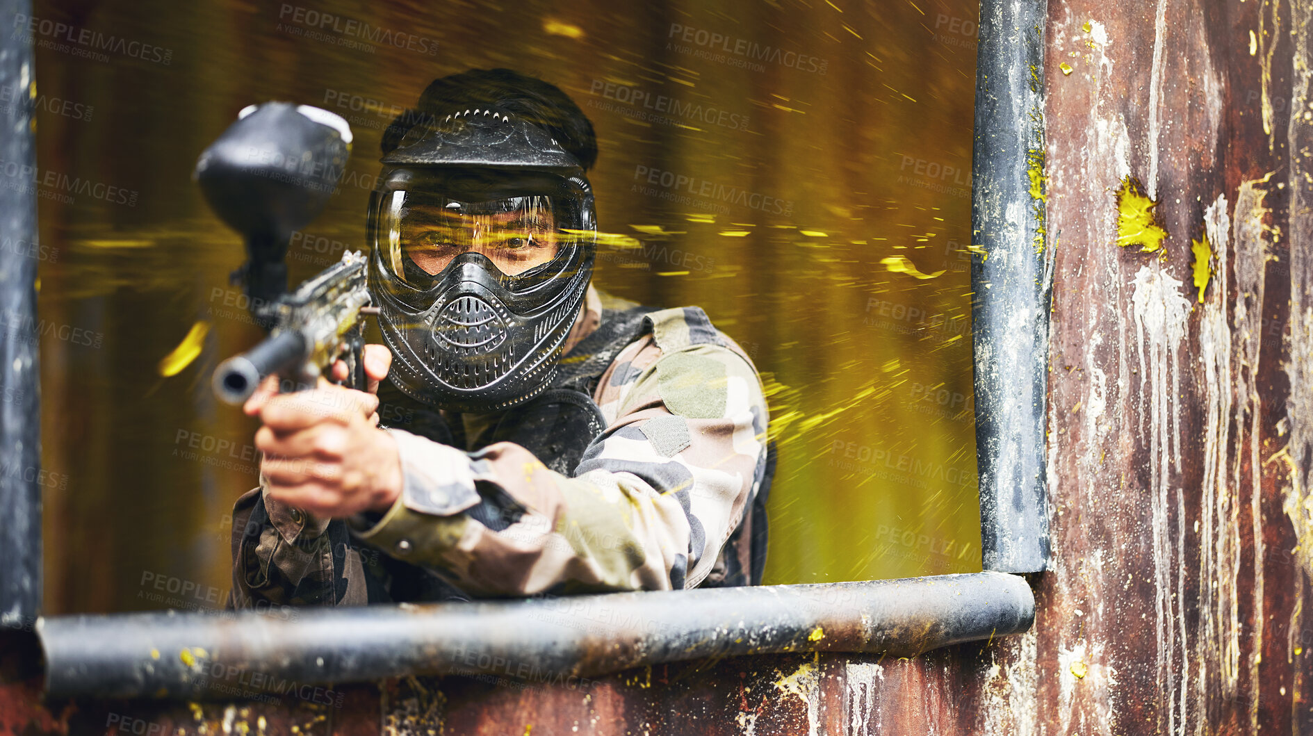 Buy stock photo Paintball, gun and soldier with a sports man playing a military game for fun or training outdoor. War, camouflage and target with a male athlete shooting a weapon outside during an army exercise