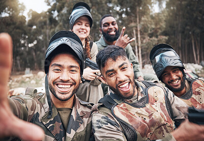 Buy stock photo Paintball, selfie and portrait of friends relax after military, training and extreme sports, fun and happy in forest. Face, diversity and army people smile for picture after game and target practice 