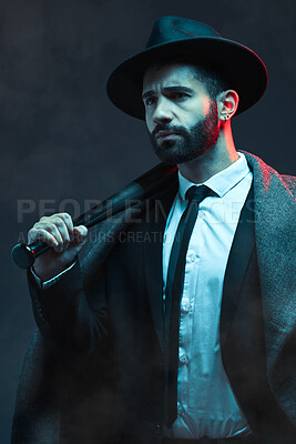 Buy stock photo Fashion, criminal and man with bat for violence for vintage, retro and Victorian gangster on dark background. Crime aesthetic, thinking and male model with designer suit, weapon and threatening face