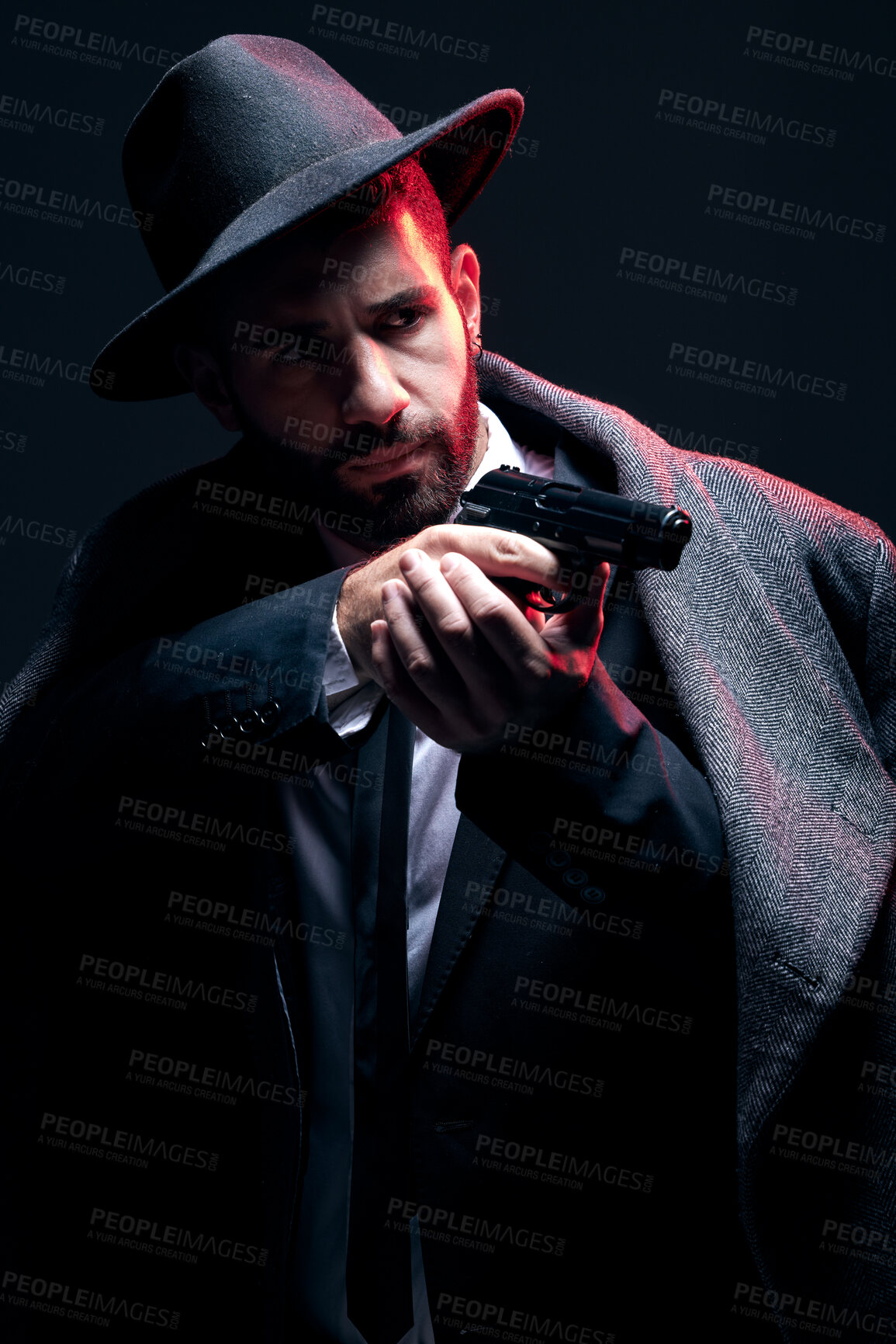 Buy stock photo Bodyguard, suit or shooting gun on studio background in dark secret spy, isolated mafia leadership or crime lord security. Model, man and gangster aiming weapon in formal or fashion clothes aesthetic