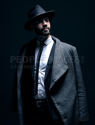 Buy stock photo Fashion, suit and classy man thinking of clothes isolated on a dark background in a studio. Mafia, idea and corporate model with fashionable, elegant and professional clothing for work on a backdrop