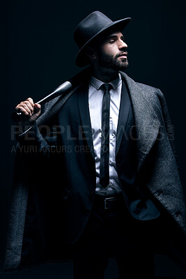 Buy stock photo Criminal, fashion and man with bat for vintage, retro and Victorian gangster on dark background. Crime aesthetic, violence and male model with baseball weapon, threatening attitude and confidence