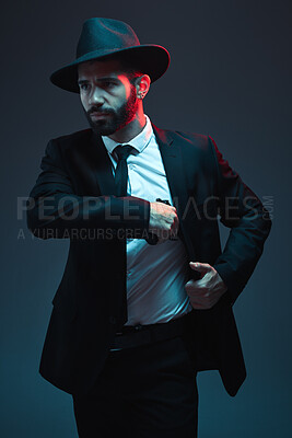 Buy stock photo Mafia, gangster and man in a classy suit for security business isolated on a dark background. Fashion, detective and professional, stylish and elegant bodyguard thinking of crime and agent work