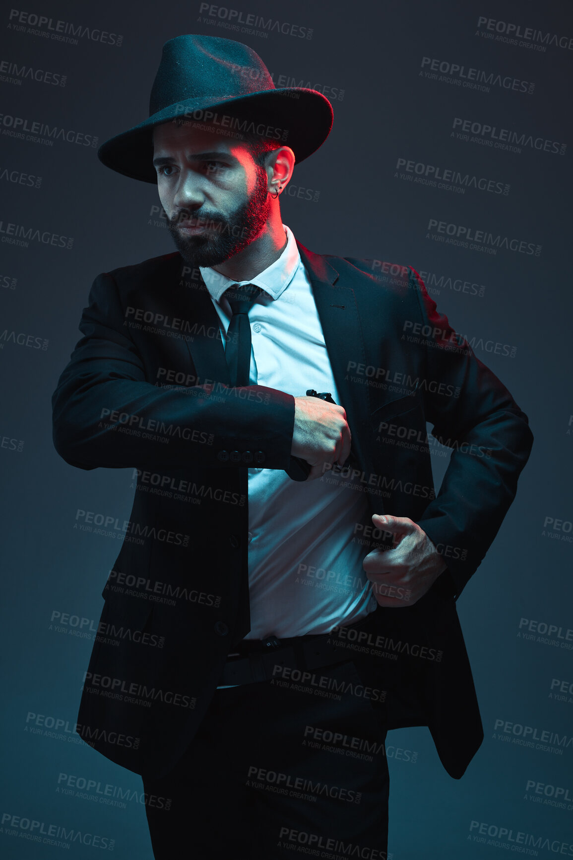 Buy stock photo Mafia, gangster and man in a classy suit for security business isolated on a dark background. Fashion, detective and professional, stylish and elegant bodyguard thinking of crime and agent work