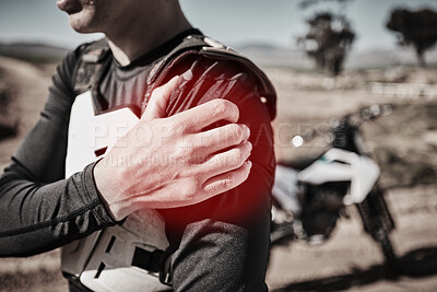 Buy stock photo Closeup, biker outdoor and shoulder pain with muscle tension, strain and inflammation while competing. Male rider, man and male athlete with stiffness, torn and accident emergency with inflamed joint