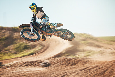 Bike, motorcycle and offroad sports with motion blur, speed challenge and desert. Driver, cycling and air jump on dirt track, competition and motorbike performance on adventure course for fast action
